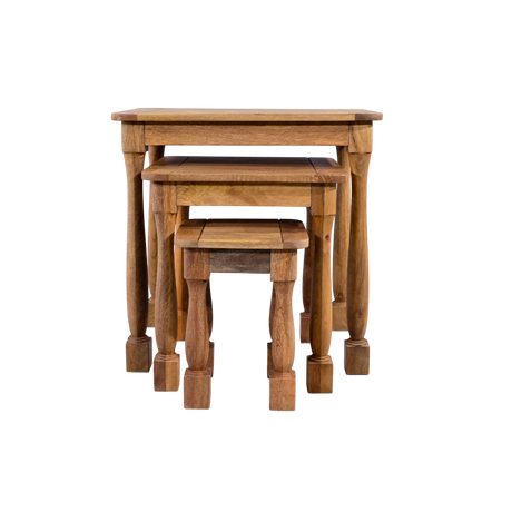Set of three wooden nesting tables on a white background