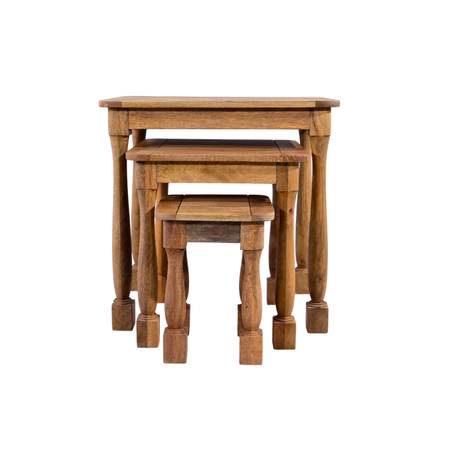 Set of three wooden nesting tables on a white background