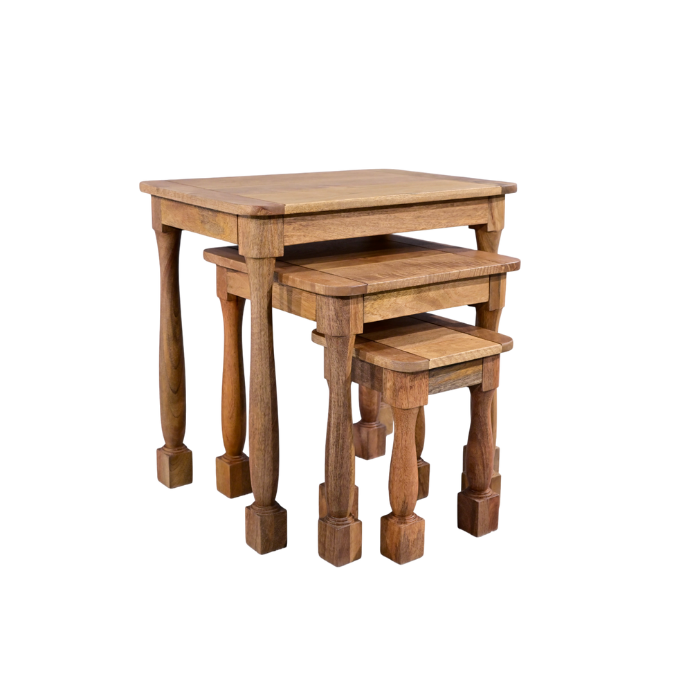 Set of three wooden nesting tables on a white background