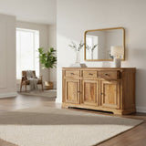 Wooden sideboard with mirror in a living room setting