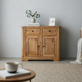 Wooden sideboard with decorative items in a room with a neutral color scheme