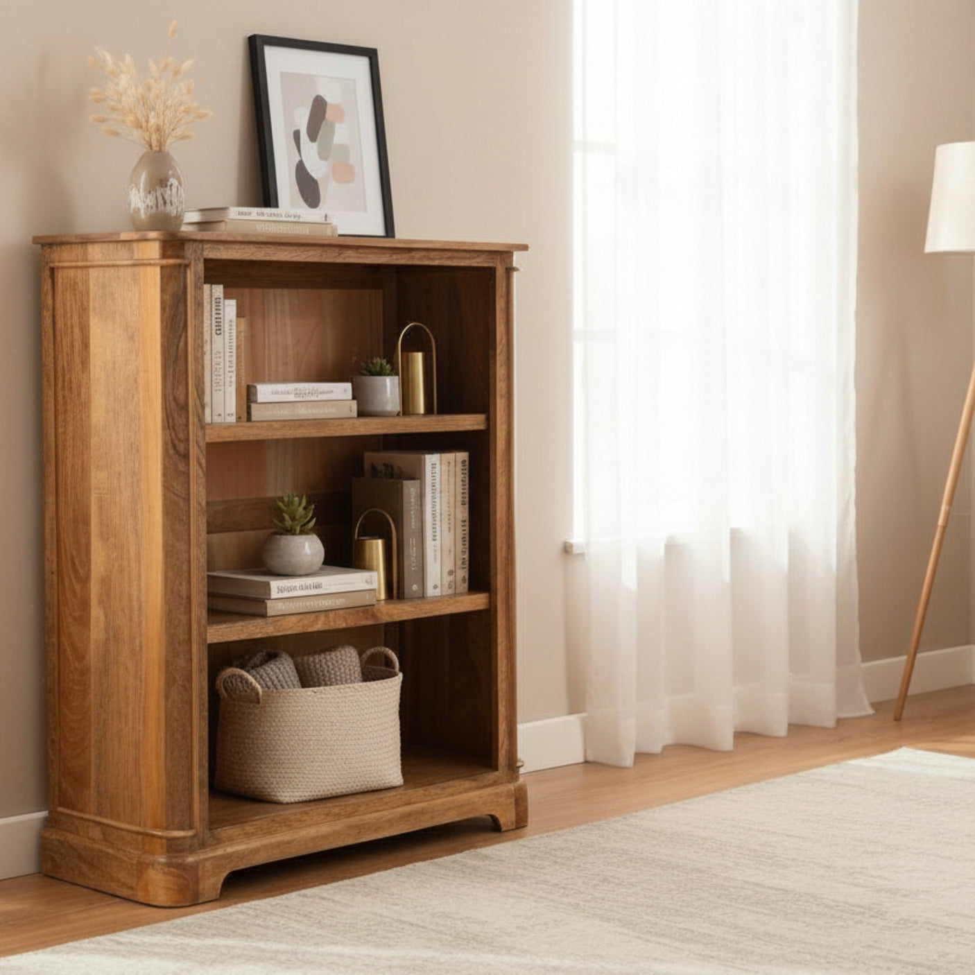 Wooden bookshelf in a room with decor items and a lamp.