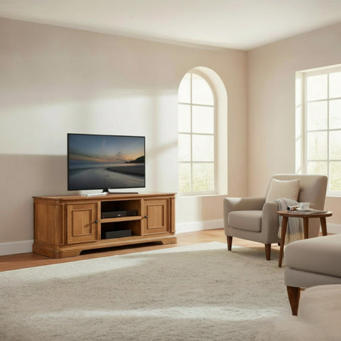 Wooden TV stand with a television displaying a beach scene in a room with a window.