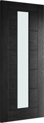 Black interior door with vertical frosted glass panel and wood grain finish, angled view