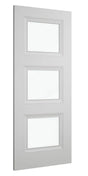 White interior door with three rectangular glass panels, shown from a side angle