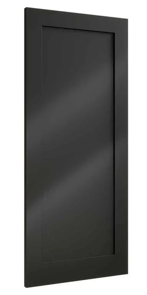 Matte black shaker kitchen cabinet door with inset panel, angled side view