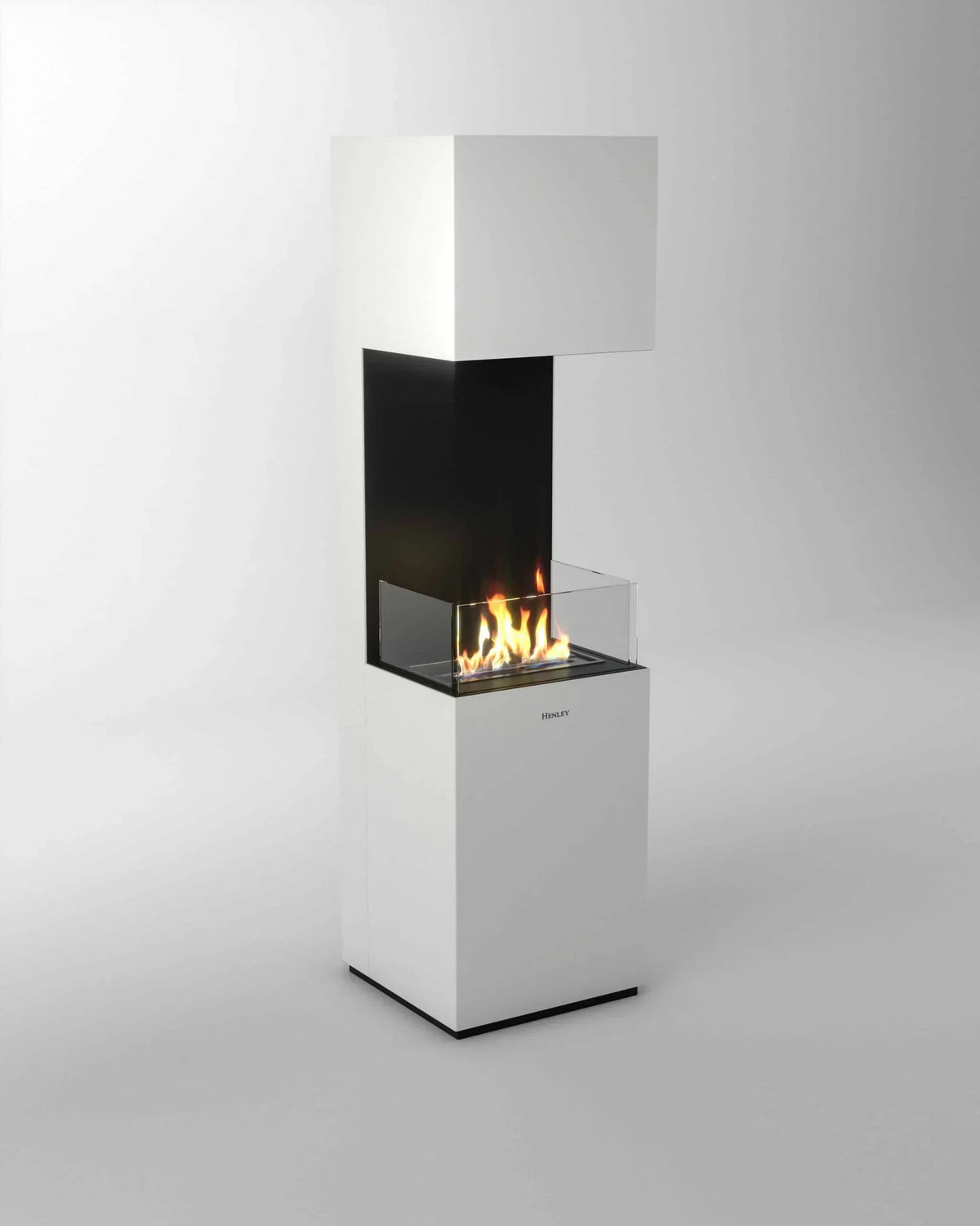 Modern freestanding bioethanol fireplace with black and white finish and visible flames