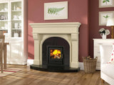 Ivory marble fireplace surround with black hearth and inset wood burning stove in living room