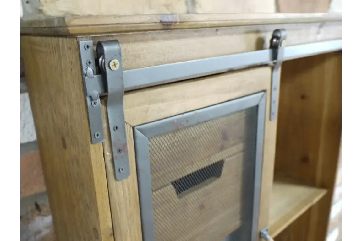 Wood cabinet door with sliding metal rail and mesh panel, industrial furniture detail