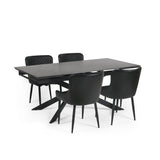 Black extending dining table with four black leather upholstered chairs featuring quilted backs.