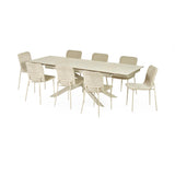 Extended light beige dining table with six cream upholstered chairs on white background, front angle