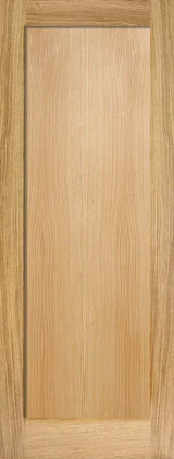 Oak internal door with one vertical panel and natural wood grain finish