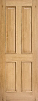 Oak internal door with four raised rectangular panels and natural wood grain finish