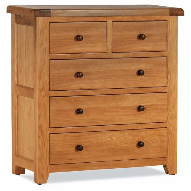 Oak chest of drawers with five drawers and metal knobs, shown from a front angle