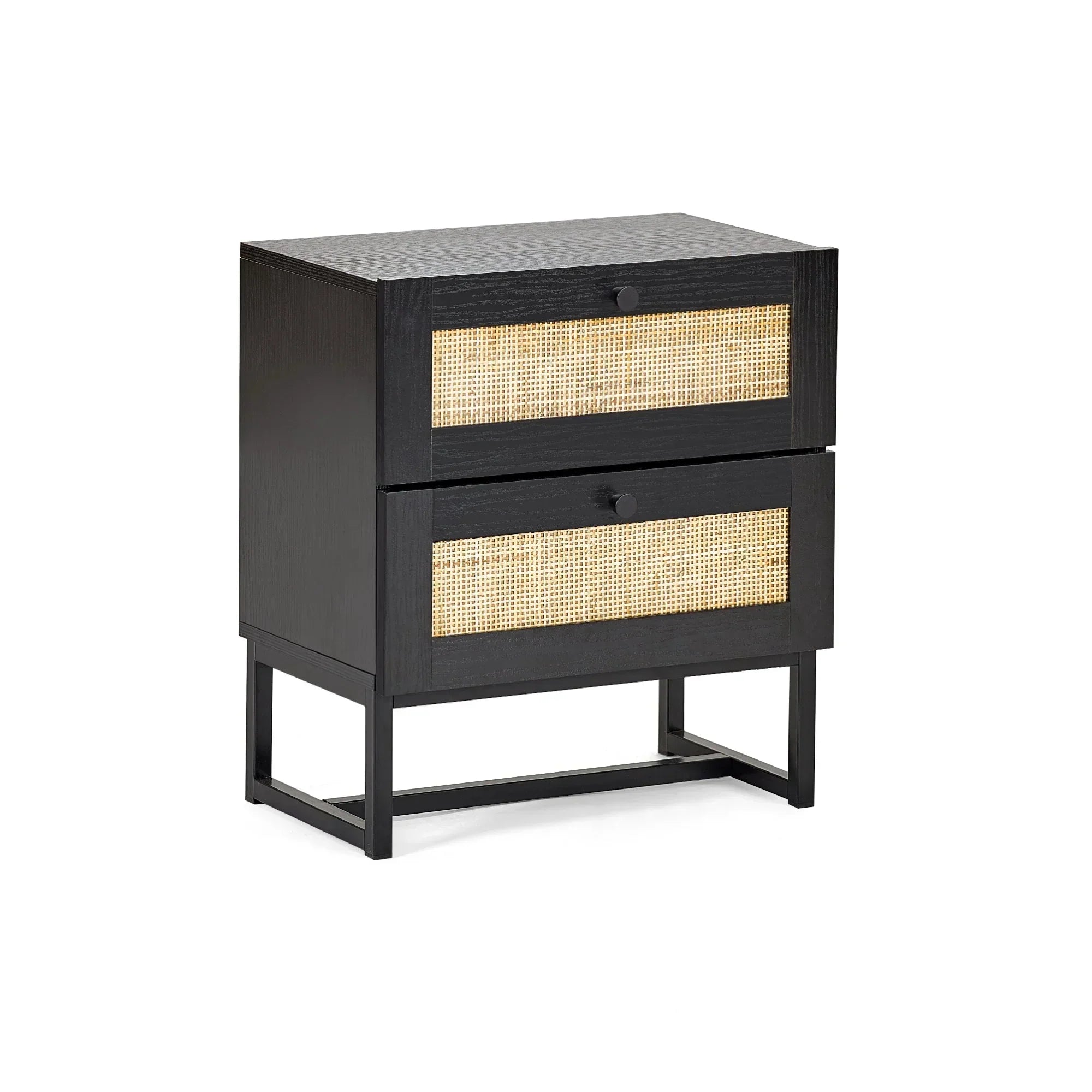 Black two drawer bedside table with rattan fronts and metal legs, angled studio view