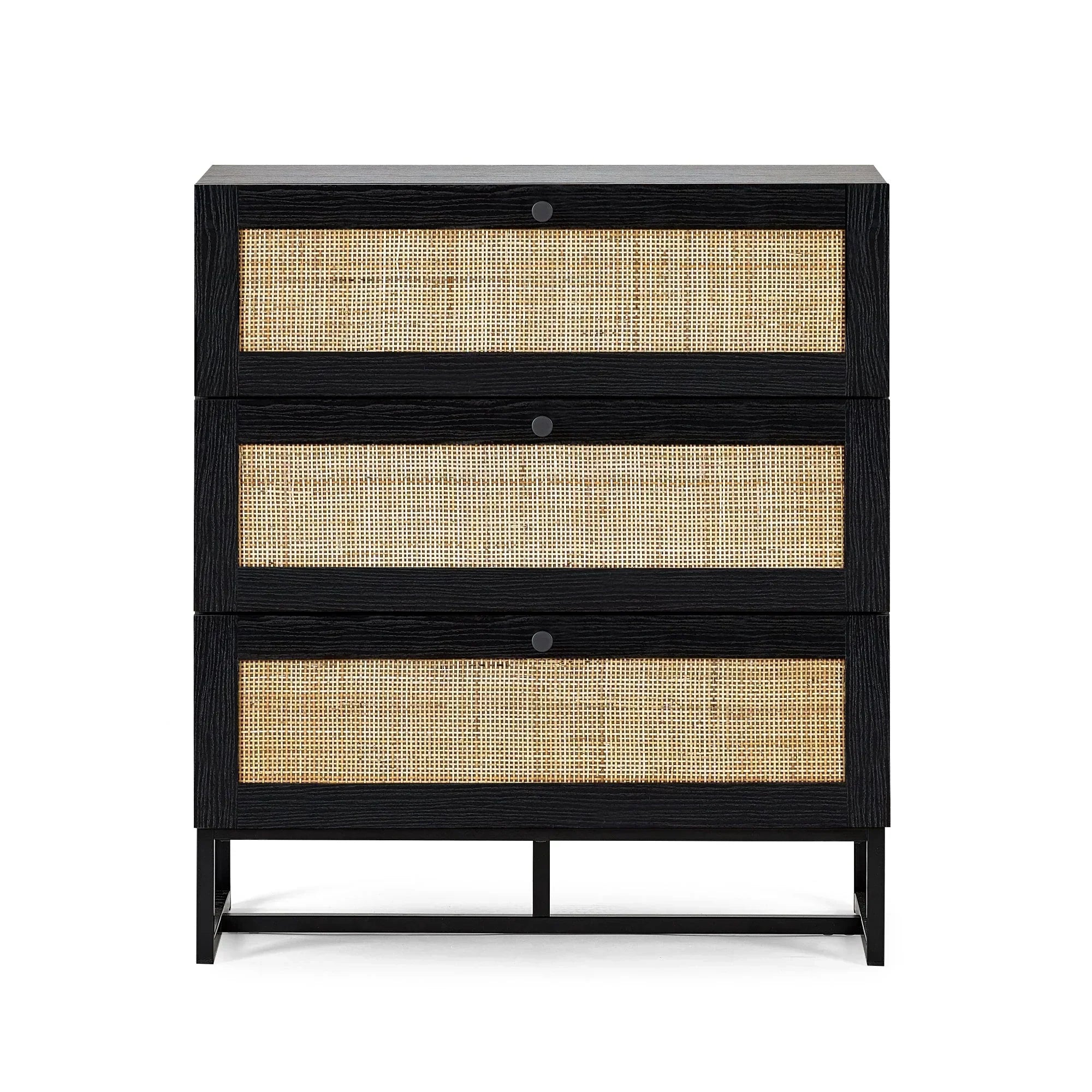 Black three drawer chest with natural rattan fronts and metal legs, cutout view