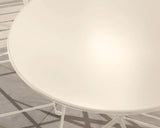 Champagne metal garden bistro table closeup showing smooth round tabletop and frame details