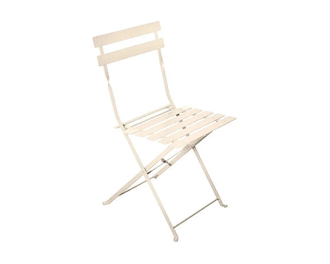 Champagne metal folding chair with slatted seat and backrest, side view