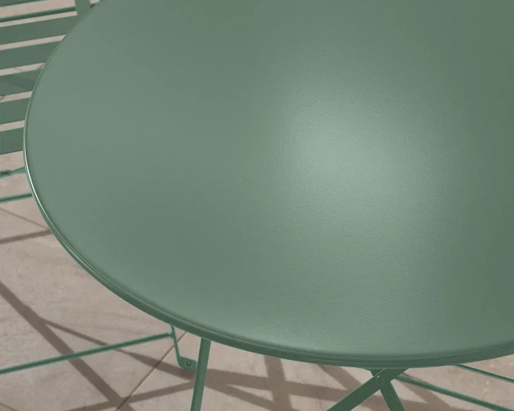 Round olive green metal garden table with matching chair on tiled patio