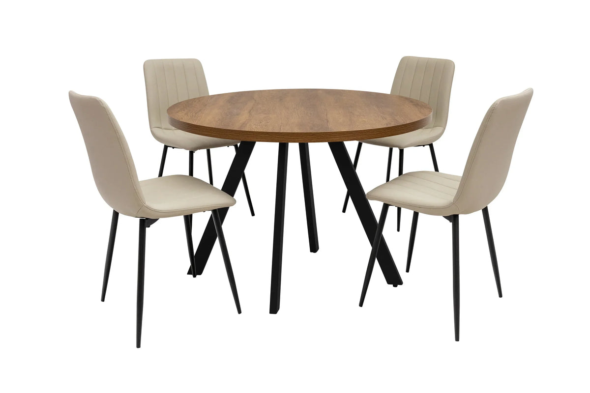 Round wood dining table with black legs and four beige dining chairs