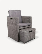 Grey rattan armchair with matching cushioned footstool set on white background
