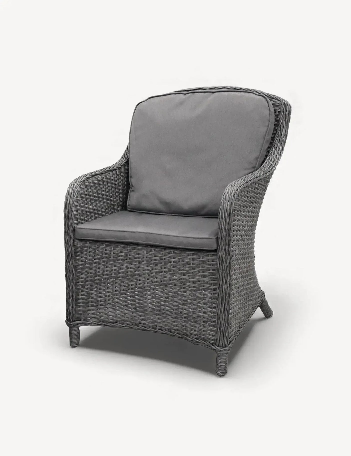 Grey rattan armchair with dark seat and back cushions, front angle view