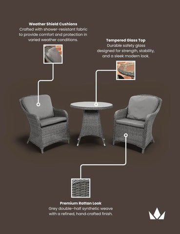 Grey rattan garden bistro set with two cushioned chairs and round tempered glass table