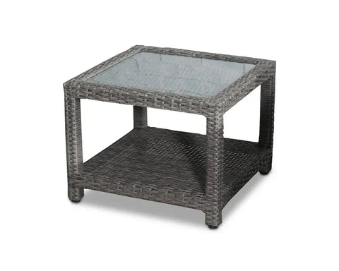 Grey rattan outdoor coffee table with glass top and storage shelf