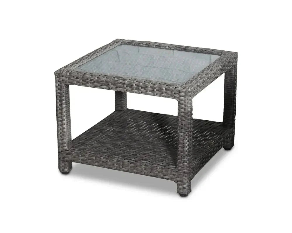 Grey rattan outdoor coffee table with glass top and storage shelf