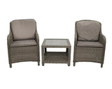 Rattan garden furniture set with two armchairs and glass-top coffee table
