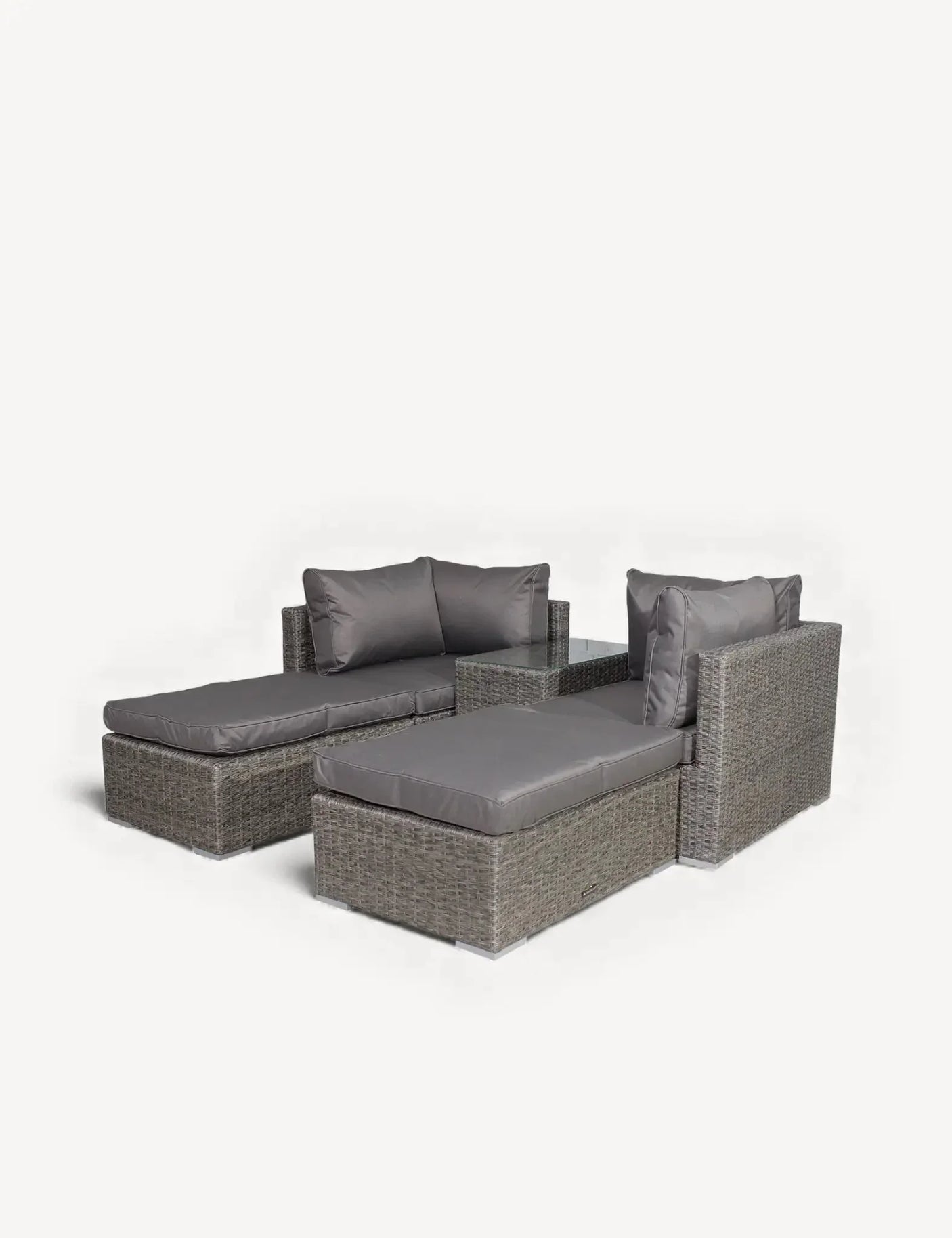 Grey rattan garden sofa set with two loungers and padded seat cushions