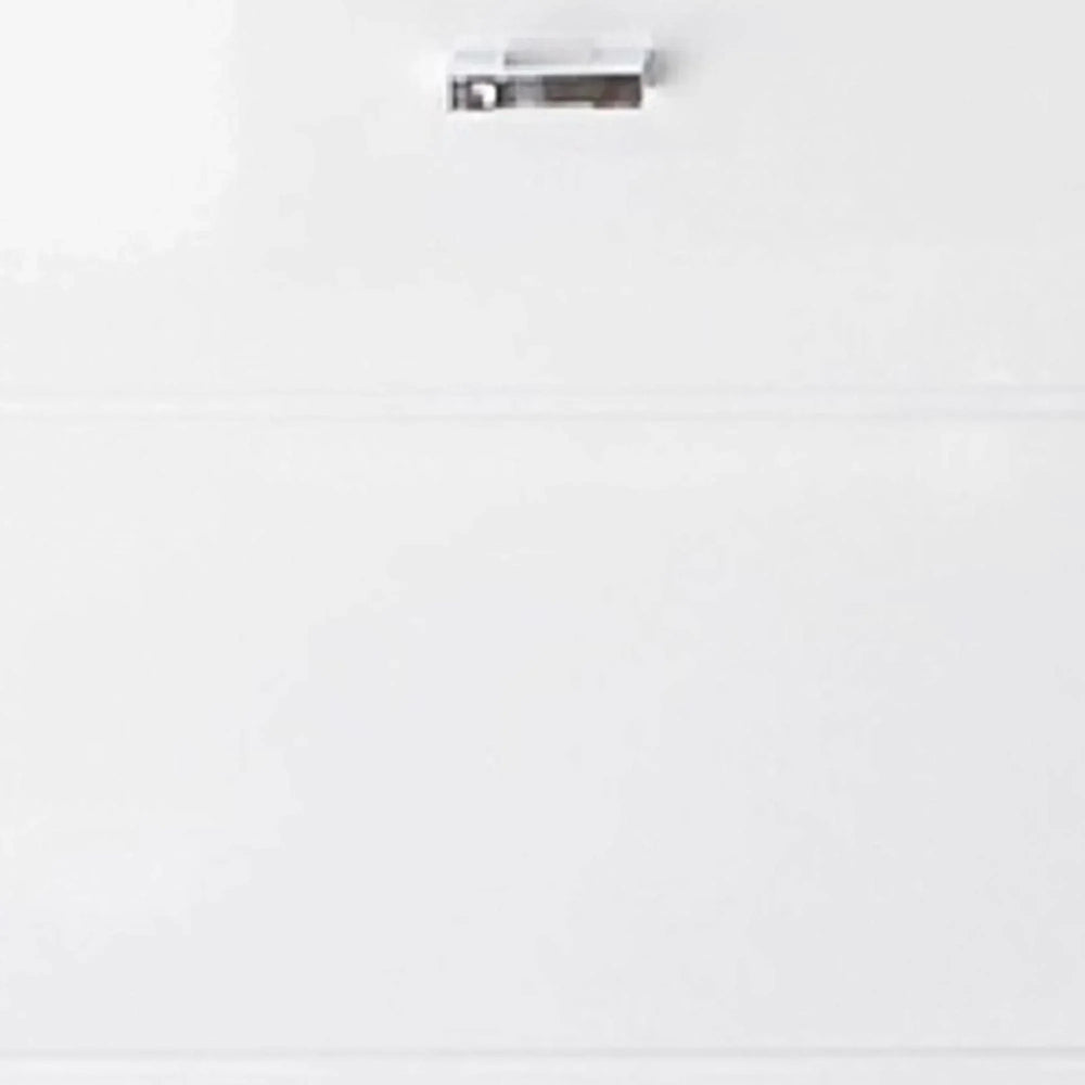 Gloss white drawer front with silver handle, modern furniture finish detail view