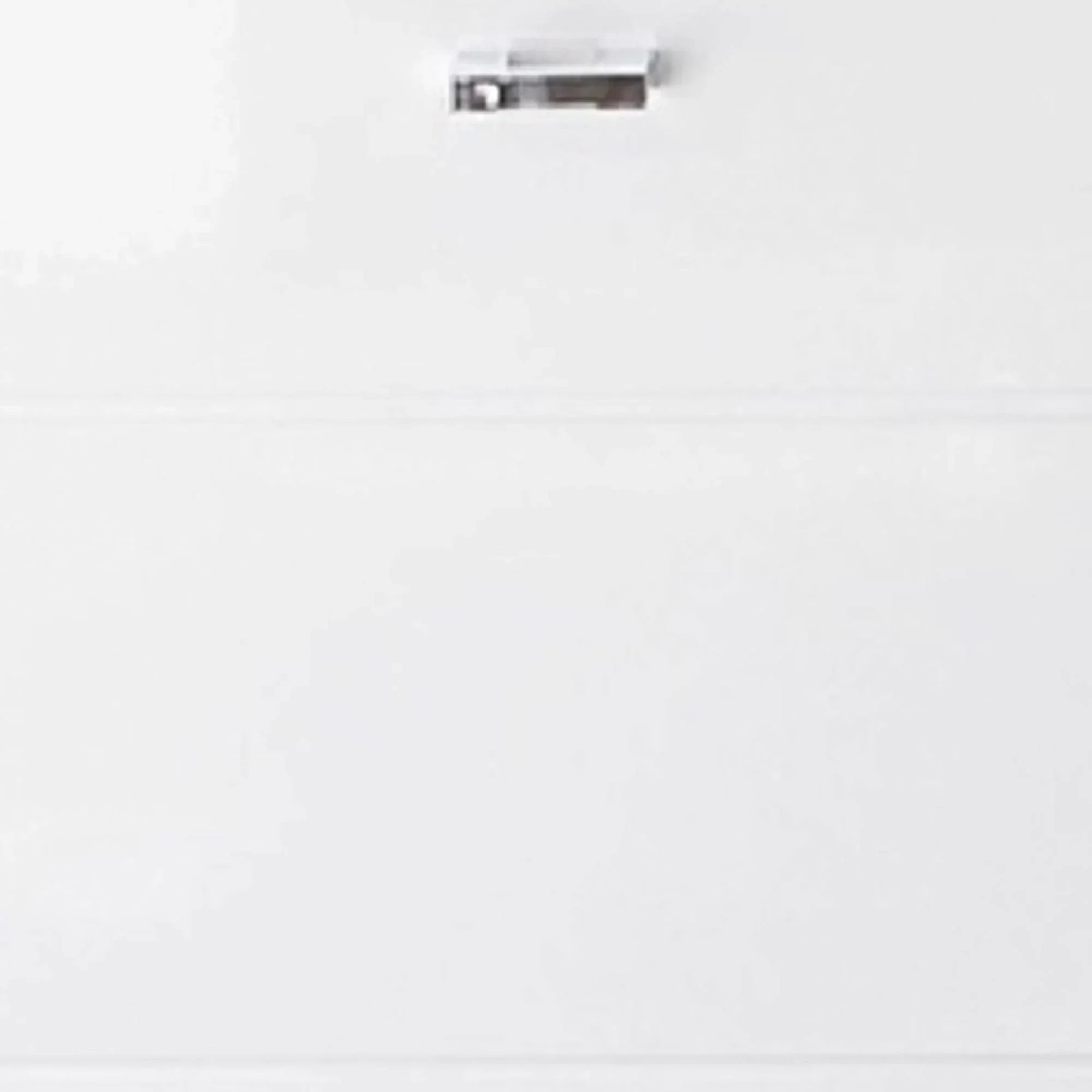 Gloss white drawer front with silver handle, modern furniture finish detail view
