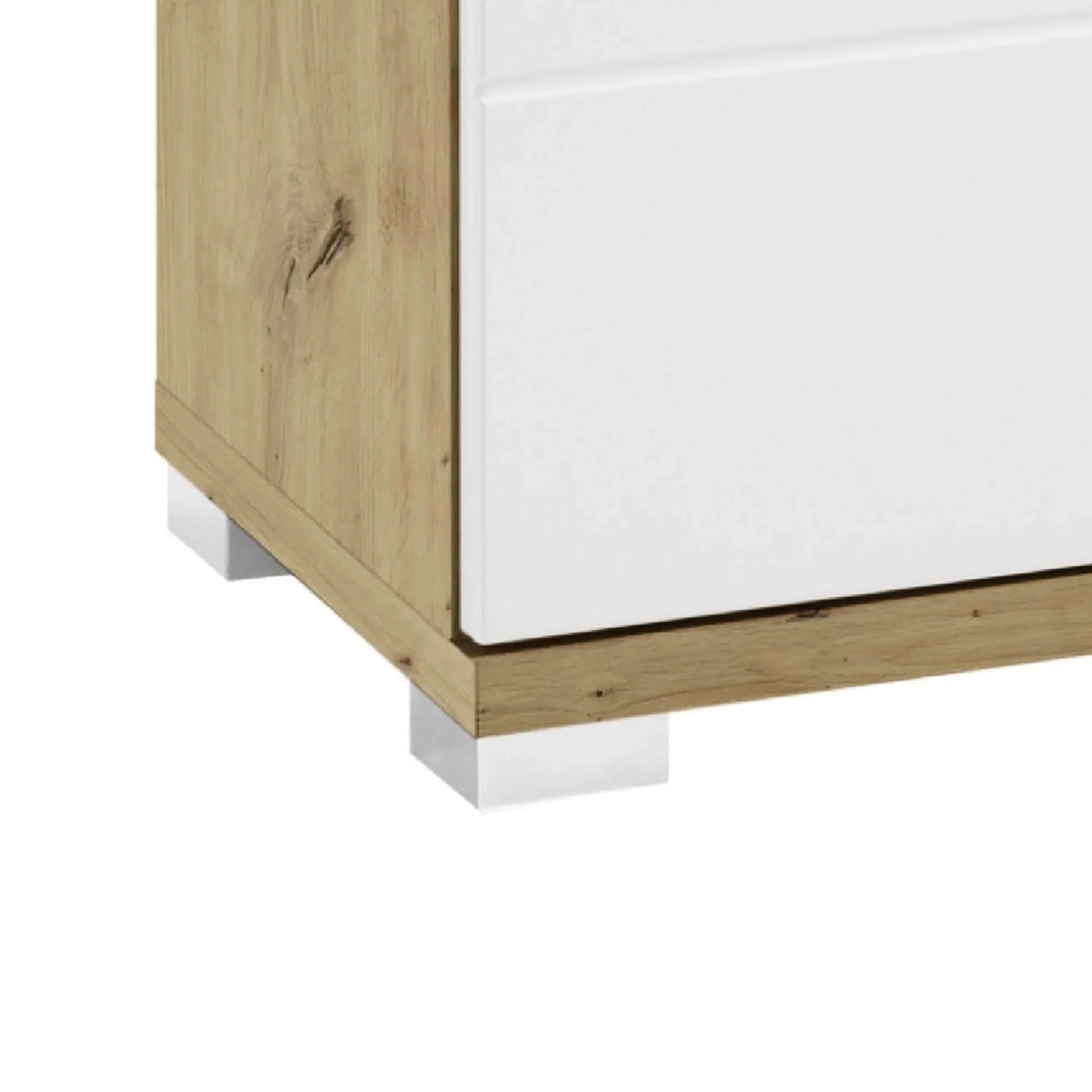 Close view of wooden bedside cabinet corner with white drawer front and chrome leg