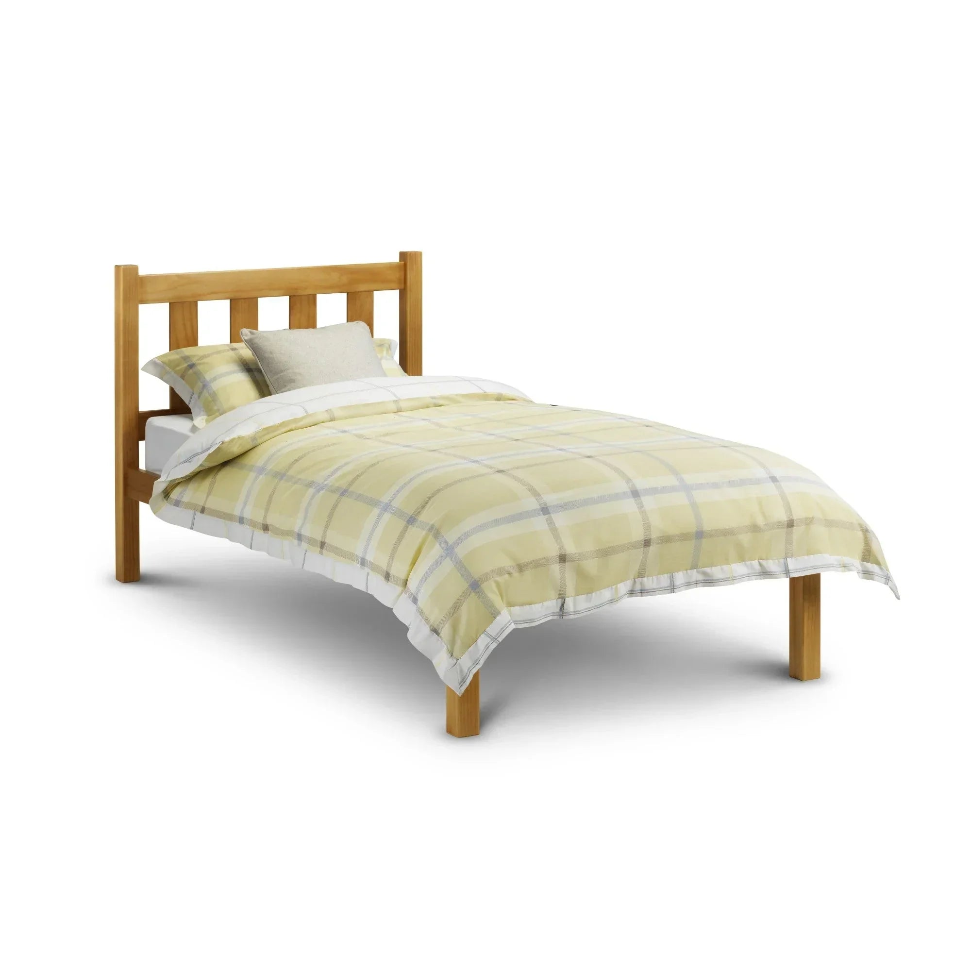 Single pine bed with slatted headboard and yellow check bedding