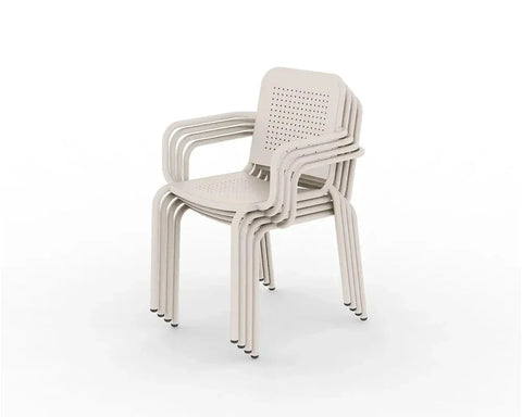 Champagne stackable plastic chairs with armrests and perforated seats, side view