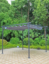 Grey metal garden pergola with retractable canopy on paved patio, surrounded by greenery