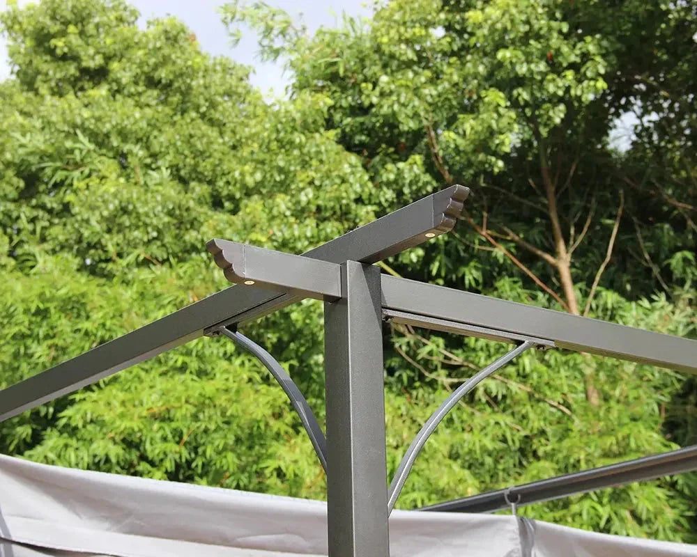 Grey pergola aluminium frame corner detail with lush garden background