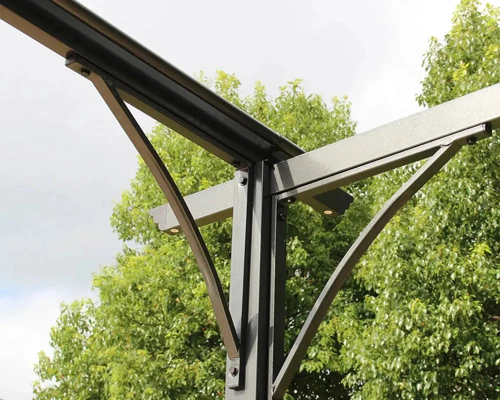 Grey pergola corner frame detail against green trees outdoors