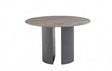 Round dining table with ribbed grey pedestal legs and wood effect top