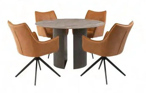 Round dining table with grey base and four tan leather chairs on black metal legs