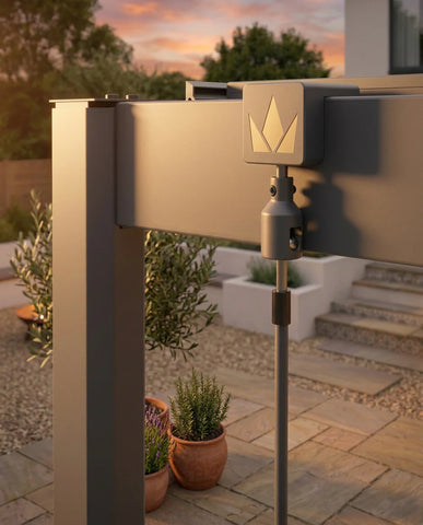 Outdoor mailbox on a stand with a garden and house in the background