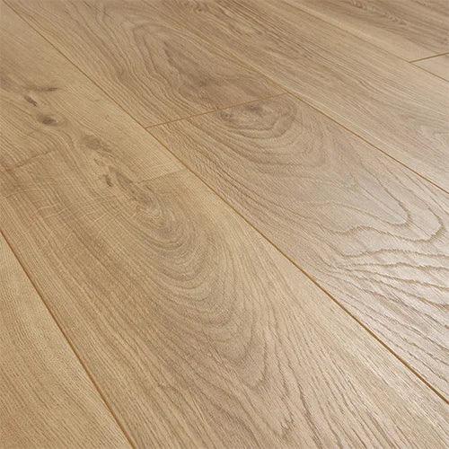 Pale oak wood flooring planks with natural grain texture in close-up view