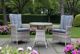 Grey rattan garden bistro set with two cushioned chairs and round table on patio