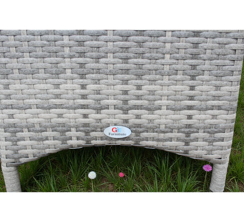 Close view of grey rattan garden bistro set table leg and weave texture outdoors