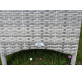 Close view of grey rattan garden bistro set table leg and weave texture outdoors