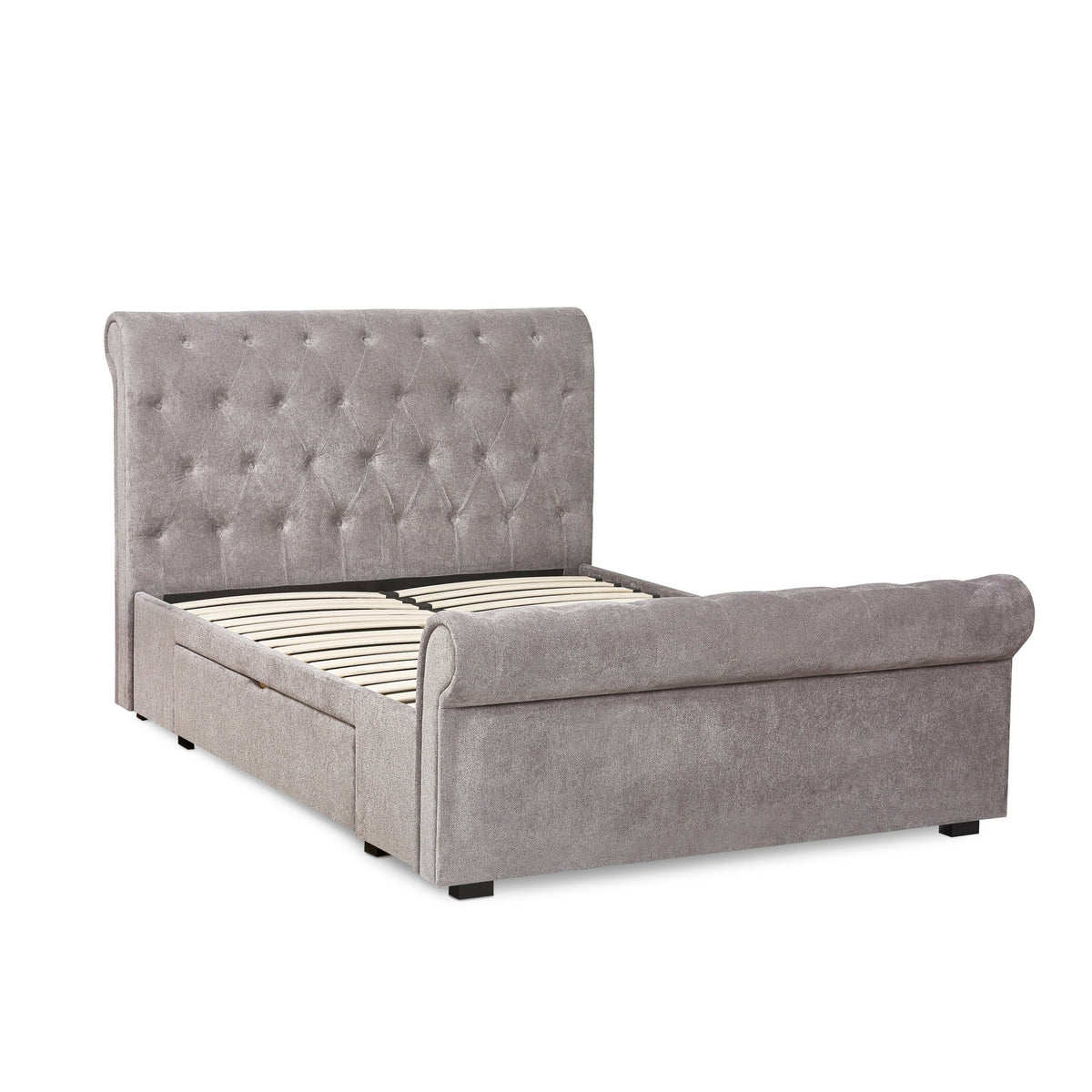 Grey fabric double bed angled from left, with right drawer pulled out showing wooden interior storage.