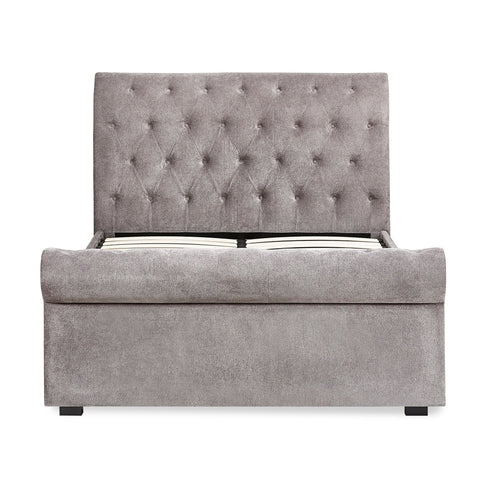 Grey fabric double bed headboard and footboard with black legs, side view showing no bedding or drawers.