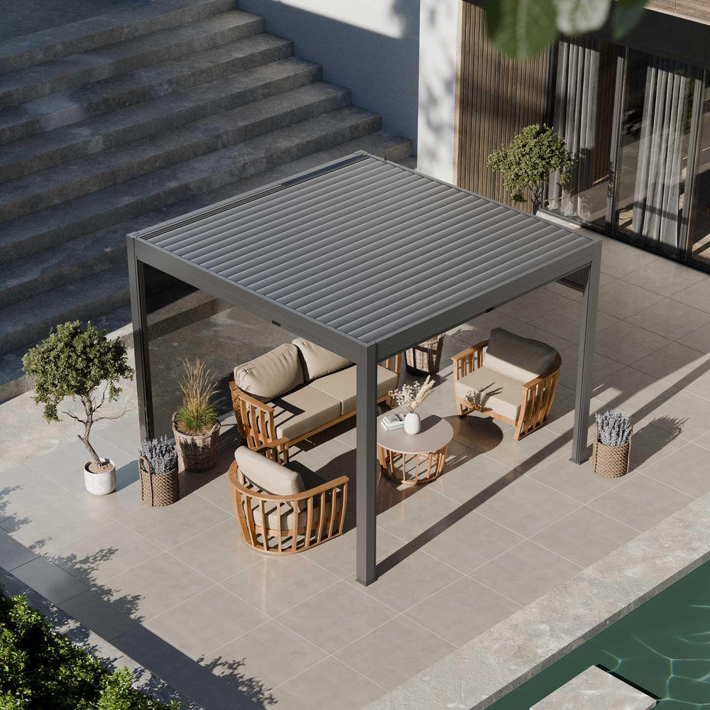 Modern outdoor pergola with grey louvered roof, patio furniture and plants near pool