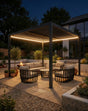 Outdoor patio area with pergola, seating, and garden lights at night.